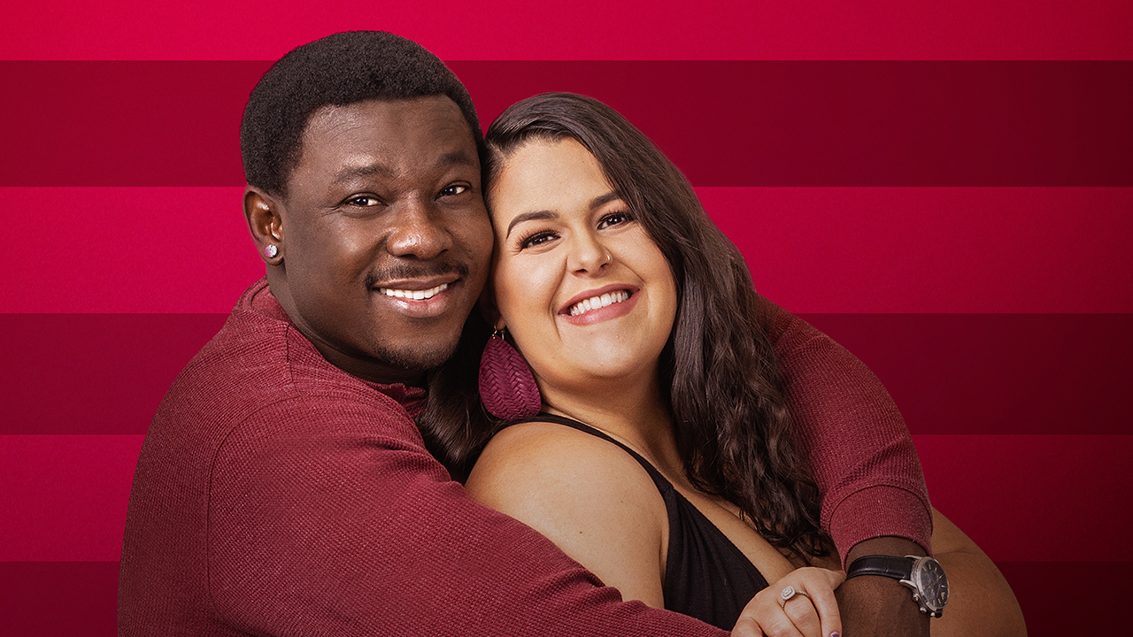 Emily and Kobe pose in studio in Salina, Kansas, as seen on 90 Day Fiancé.