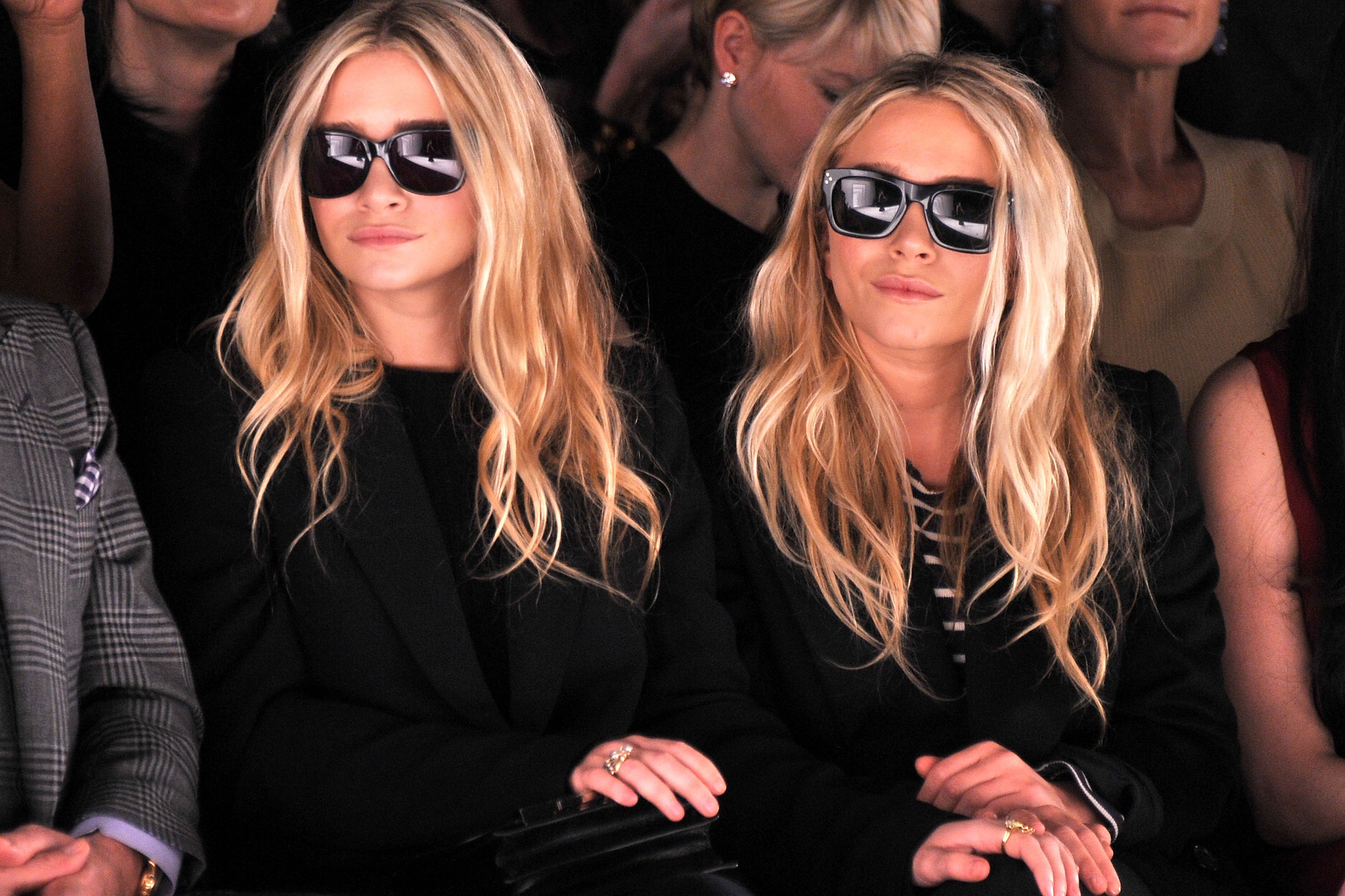 Ashley Olsen and Mary-Kate Olsen attend the J. Mendel Fall 2012 fashion show during Mercedes-Benz Fashion Week at The Theatre at Lincoln Center on February 15, 2012 in New York City.