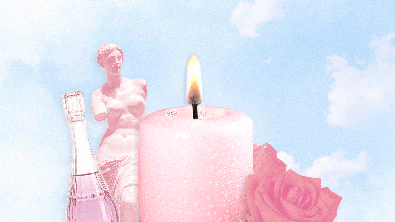 Pink candle beside statue of Venus de Milo, pink potion bottle, and a pink rose with a blue sky in the background