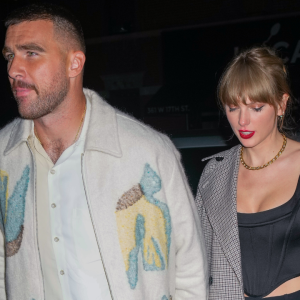 Image of Travis Kelce holding hands with girlfriend Taylor Swift while out on a date.